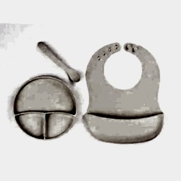 Krem Rengi 3’lü Silikon Yemek Seti – Önlük + Diş Kaşıyıcılı Kaşık + Vakumlu Tabak